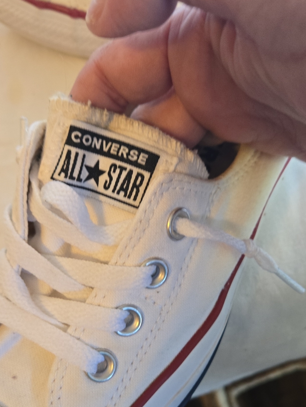 Converse White Low Top Sneakers with Red Stripe